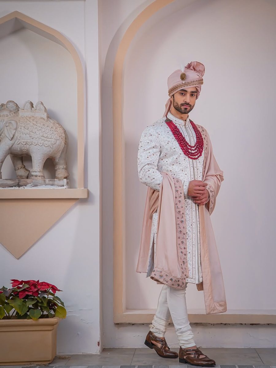 Indian groom with red necklace